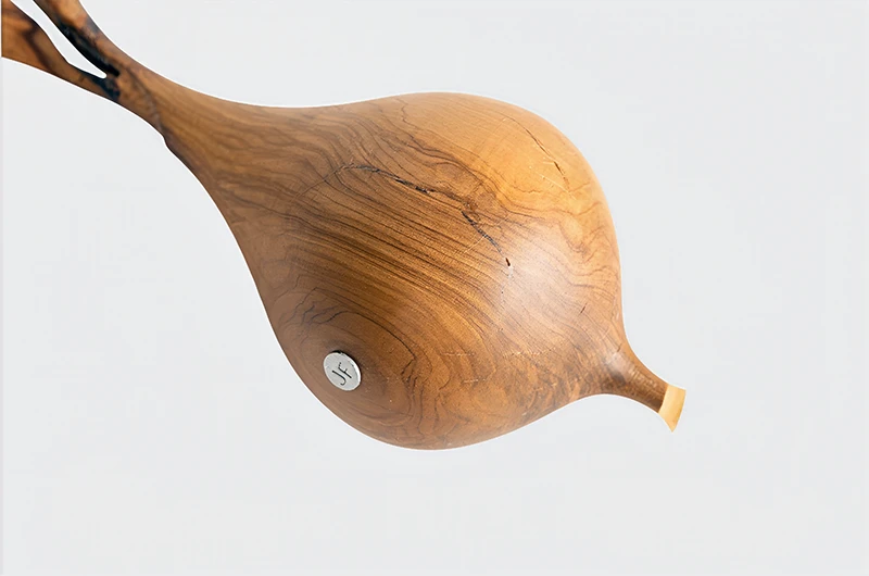 Olivenholz in the shape
